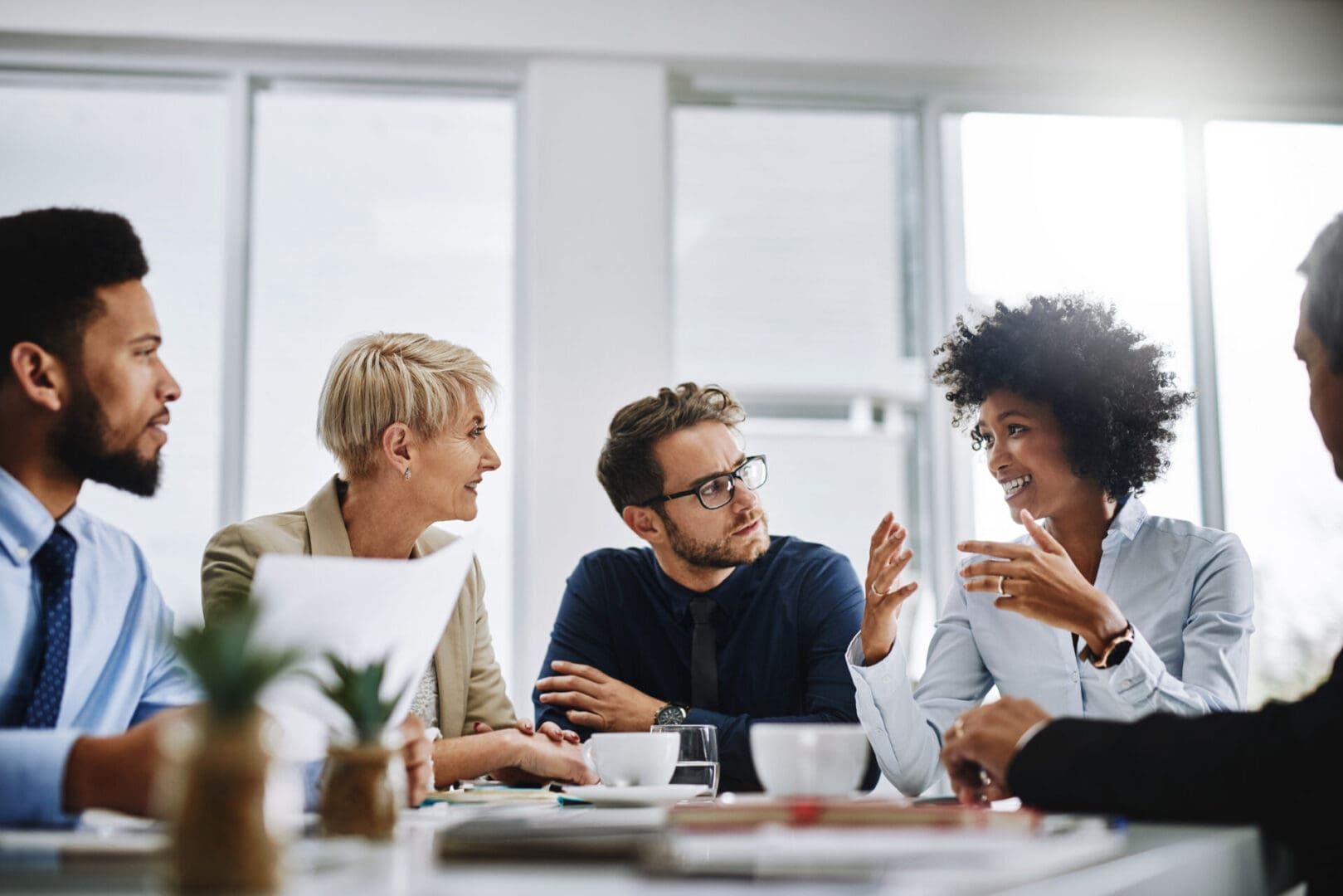 Group discussing ideas in a business meeting.